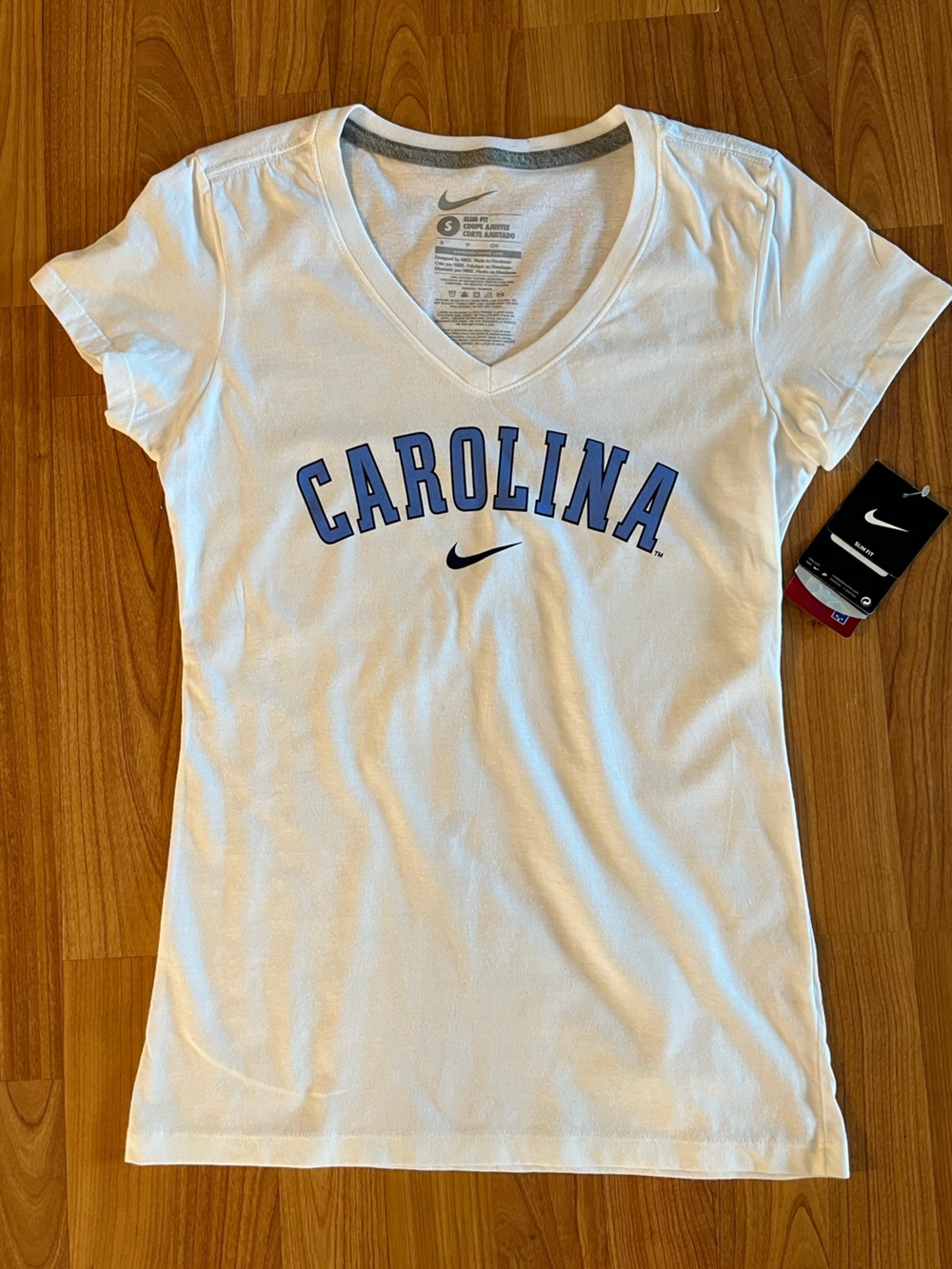 NWT- Nike Women's White V-Neck Tee with Carolina Blue Lettering